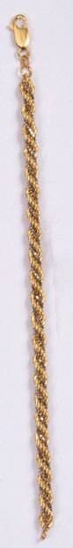 null BRACELET in yellow and white gold, twisted links.
Pds: 9 g