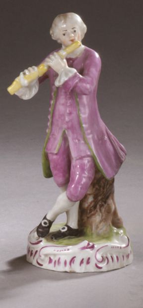 Thuringe Two porcelain statuettes representing musicians: one man playing the hunting...