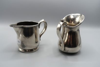 null 2 milk jugs of baluster shape on silver plated metal heel. H: 11 cm and 9.5...