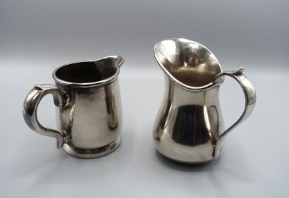 null 2 milk jugs of baluster shape on silver plated metal heel. H: 11 cm and 9.5...