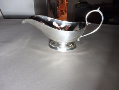 null HELMET CASTLE on oval beaded foot, loop handle with silver plated metal lug....
