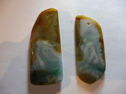null TWO rectangular blade-shaped pendants with green vein jade, 8.3 x 3.2 cm ea...