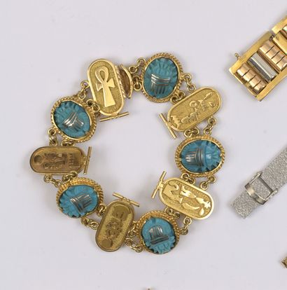 null Egyptian style BRACELET in yellow gold decorated with hieroglyphs and set with...