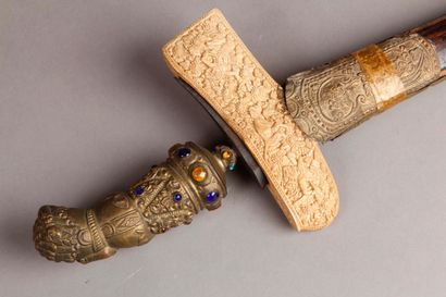 null Important KRISS. Handle made of brass and coloured stones decorated with divinity....