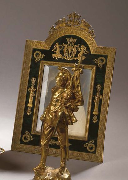 null PHOTO FRAME in bronze surmounted by griffins facing each other, decorated with...