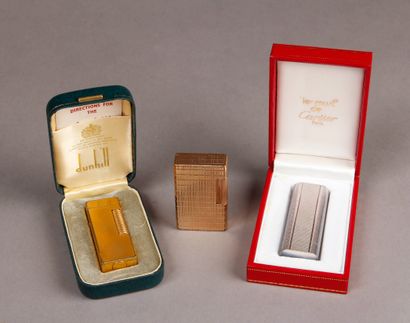  Three lighters Dunhill, Dupont and Cartier.