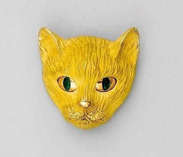 Pendentif en or «Tête de chat» les yeux sertis...