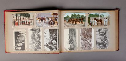 null [War 14-18]. TWO ALBUMS. An album of 190 photographic postcards, and caricatures...
