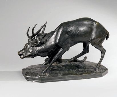 - D'après Antoine-Louis BARYE (1796-1875) Tigre attaquant un cerf Epreuve en bronze...