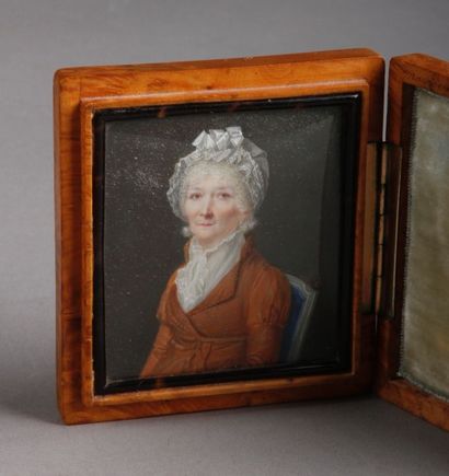 École FRANÇAISE vers 1790 Portrait d'une femme en robe brune et coiffe de dentelle...