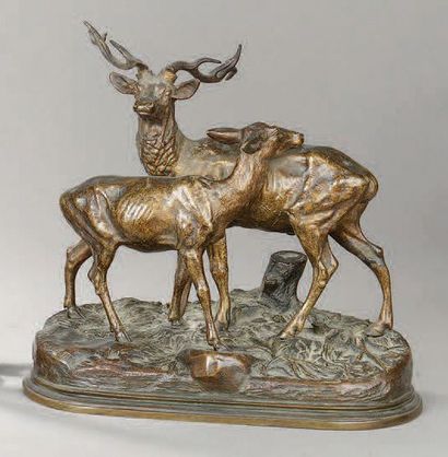 Alfred DUBUCAND (1828-1894) Accolade d'un cerf et d'une biche sur une terrasse oblongue...