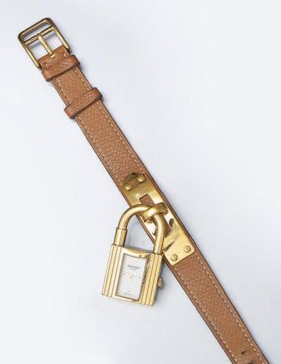 HERMES Paris Swiss made, numéro 685525 MONTRE Kelly plaqué or, cadran blanc, bracelet...