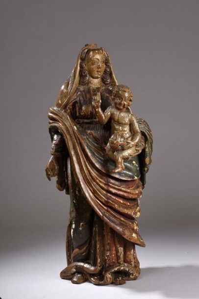 null Grande vierge à l'enfant en noyer sculpté polychrome en ronde bosse.
Fin XVIe-début...