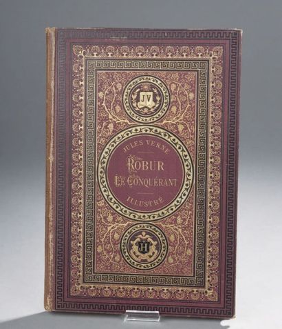 Jules VERNE 
ROBUR LE CONQUÉRANT. Edition
Hetzel. Aux Initiales, violet foncé (dos...