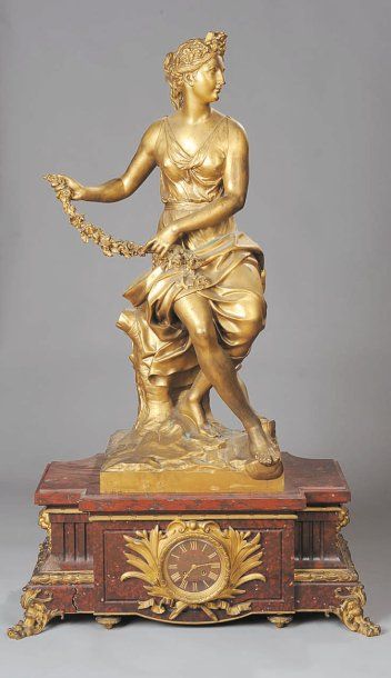 null Importante pendule en bronze ciselé et doré, marbre griotte, à décor d'une allégorie...