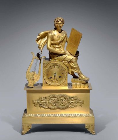 null Pendule borne en bronze doré à décor d'Apollon avec sa lyre assis sur une borne,...