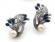 null PAIRE DE CLIPS D'OREILLE en or gris sertis de diamants de taille brillant, de...