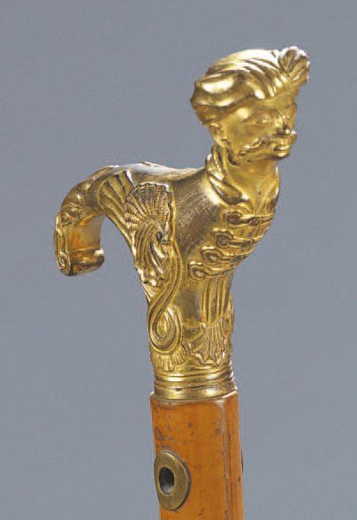null Canne à pommeau en bronze ciselé et doré en forme de buste de turc portant un...