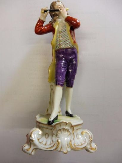 null ‘’Le joueur de flûte’’ porcelaine polychrome H : 15 cm (bon état)