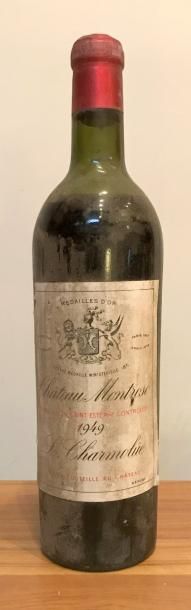 null Une bouteille Château MONTROSE 2éme GCC -
Saint Estephe 1949.
(Niveau mi-ép...