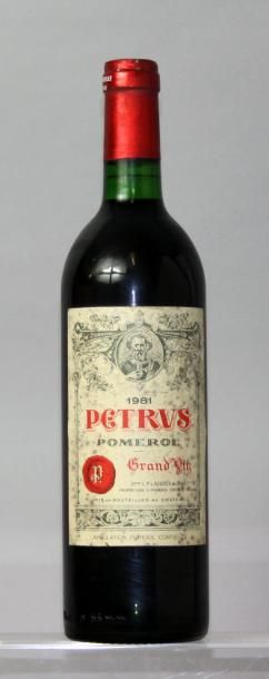 null Une bouteille PETRUS 1981. (Etiquette légèrement tachée, niveau bas goulot)...