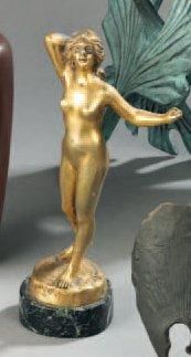 Jean GARNIER (1853-c.1910) Le réveil Bronze à patine dorée. Signé. H. 16,5 cm Monté...