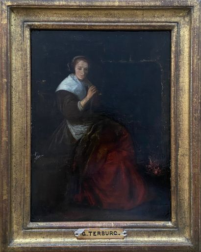 null Dans le goû de Gerard TER BORCH (1617-1681)
Femme fumant la pipe 
Huile sur...