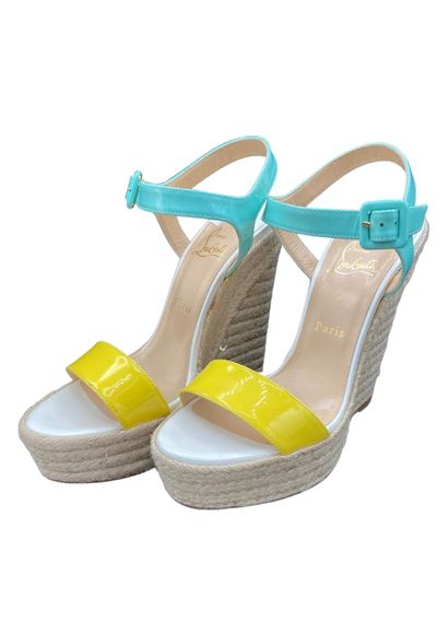 null LOUBOUTIN Paris 
Espadrilles en cuir azur et jaune
Talon 15 cm 
Taille 38

Etat...