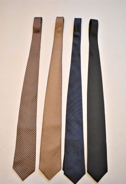 null Lot de quatre cravates en soie unie ou imprimée. 

Alain Figaret.