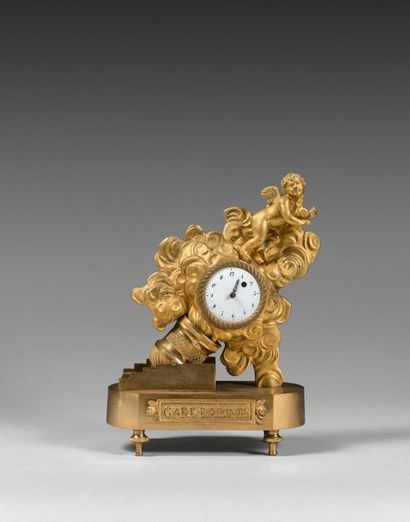 null Pendulette porte-montre «GARE LA BOMBE» en bronze

doré représentant un amour...