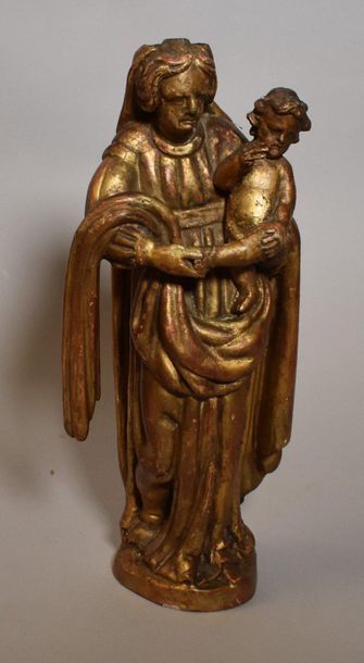 VIERGE à l'Enfant in gilded wood. Height...