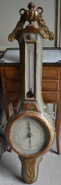 null BAROMЀTRE in painted and gilded wood surmounted by a column thermometer and...