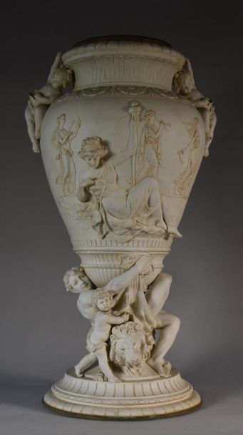 VASE mounted in biscuit with relief decoration...