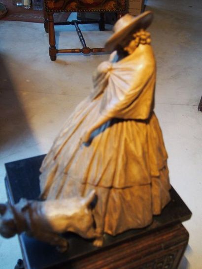 null STATUETTE in tinted plaster: Elegant holding her dog on a leash. Height 39 cm



STUDY...