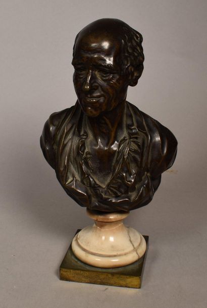  BUST of Voltaire in bronze. Signed Thomire and dated 1778. Turned white marble base....