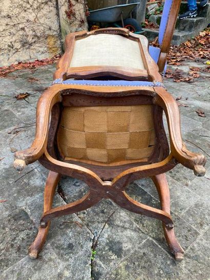  TWO natural wood chairs moulded and carved with shells, the flat backrest resting...