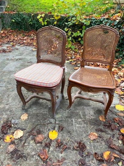 null PAIR OF CANNED CHAIRS in natural wood carved and moulded with flowers and shells,...