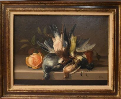 null CANVAS: Still life with birds and orange. Signed Félix at the bottom right....