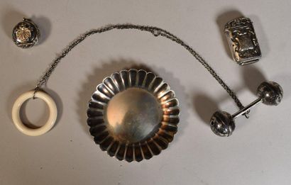 null SILVER LOT: Puiforcat cup, two matchboxes or pills, rattle. Total gross weight...