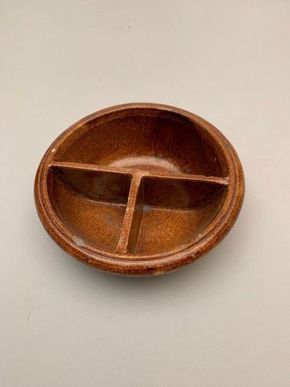 null Brown glazed earthenware baptism dish. West of France. 

Diam. 22 cm

(A few...