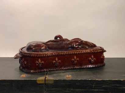 null Hare's lodge in pink earth with a manganese brown glaze, with a violin body...