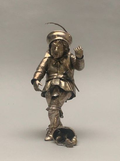 null Figurine representing a dwarf or a grotesque character in silvery metal. Italy....