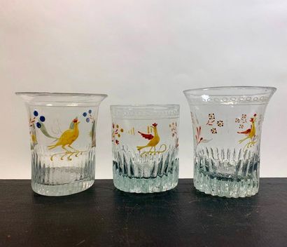 null Three Norman cups made of translucent colourless glass with a trendy bird enamel...
