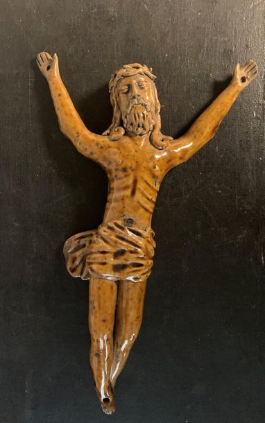 null Christ modeled in stoneware glazed with slag (arm glued back).

Height 30 cm...