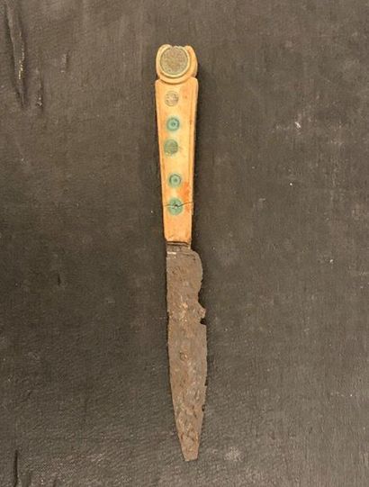 null Medieval period knife with a bone handle whose rivets are dressed with bone...