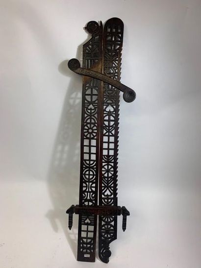 null Rack and pinion door with openwork decoration of windows, hearts, rouelles and...