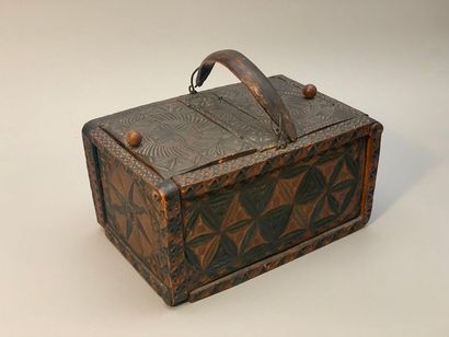 null Carved polychrome walnut basket with wickerwork bottom, with two flap lids and...