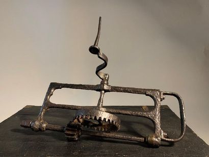 null Highly oxidized iron chigniole. 19th century. 

Length. 37 cm 
