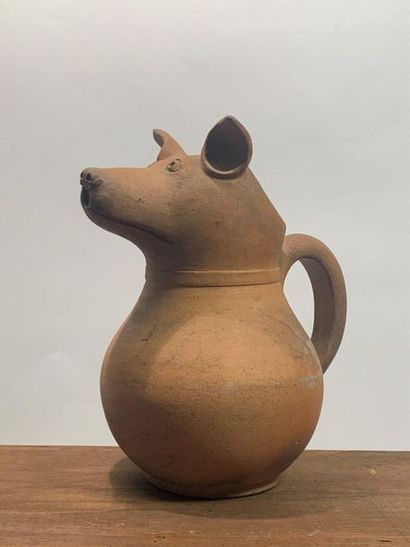 null Terracotta dog-headed pitcher. Nibelle. Circa 1900. 

Height. 22,5 cm

(Crashing...