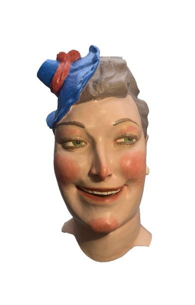 null Two big heads: Woman with the headband and Woman with the hat, made of polychrome...